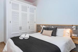 Postel nebo postele na pokoji v ubytování Casa Volcán y Mar