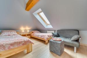Łóżko lub łóżka w pokoju w obiekcie Apartamenty Krystyna
