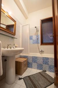 Kúpeľňa v ubytovaní Corallo holiday house Acitrezza