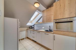 Kuchnia lub aneks kuchenny w obiekcie Apartamenty Krystyna