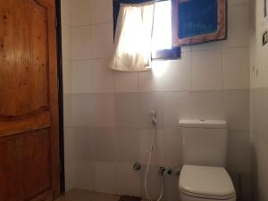 Ванная комната в Habiba Beach Lodge