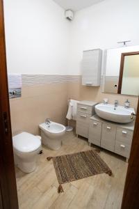 Kúpeľňa v ubytovaní Corallo holiday house Acitrezza