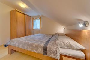 Łóżko lub łóżka w pokoju w obiekcie Apartamenty Krystyna