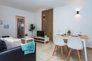 TV a/nebo společenská místnost v ubytování Casa Volcán y Mar