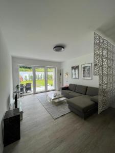 Posezení v ubytování Luxuriöses Apartment für 4 Personen, Neubau, Parkplatz free
