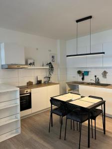 Kuchyň nebo kuchyňský kout v ubytování Luxuriöses Apartment für 4 Personen, Neubau, Parkplatz free