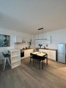 Kuchyň nebo kuchyňský kout v ubytování Luxuriöses Apartment für 4 Personen, Neubau, Parkplatz free
