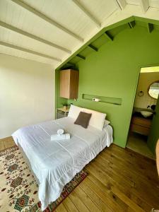 Letto o letti in una camera di Soy Local Guatape