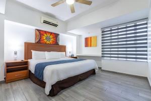 Postel nebo postele na pokoji v ubytování European Life Style Executive Suites