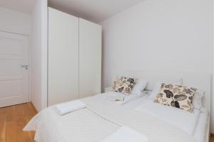 Posteľ alebo postele v izbe v ubytovaní Beautiful Apartment Gdynia Czarnieckiego with Balcony by Noclegi Renters