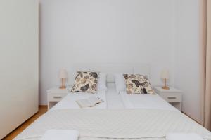 Posteľ alebo postele v izbe v ubytovaní Beautiful Apartment Gdynia Czarnieckiego with Balcony by Noclegi Renters