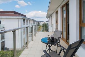 Balkón alebo terasa v ubytovaní Beautiful Apartment Gdynia Czarnieckiego with Balcony by Noclegi Renters