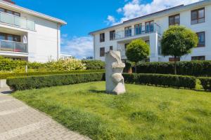 Vonkajšia záhrada v ubytovaní Beautiful Apartment Gdynia Czarnieckiego with Balcony by Noclegi Renters