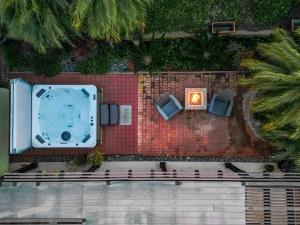 an overhead view of a backyard with a swimming pool at CB-5515 - Walk to Beach - Private Hot Tub - Ideal Location in Carlsbad
