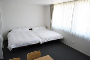 Center Point In Kanazawa客房内的一张或多张床位