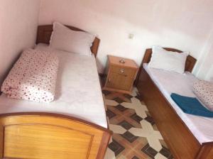Postelja oz. postelje v sobi nastanitve Evergreen guest house