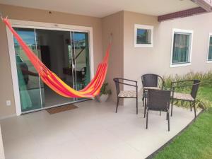 Zahrada ubytování Cantinho do Atalaia à 650 metros da praia - Seu conforto fora de casa + 37 fotografií