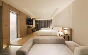 The Van Hotel客房内的一张或多张床位