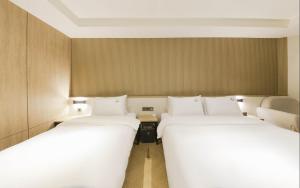 The Van Hotel客房内的一张或多张床位