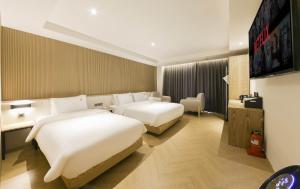 The Van Hotel客房内的一张或多张床位