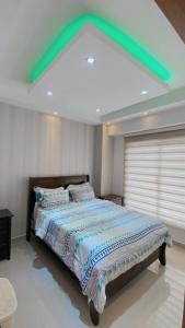 Postel nebo postele na pokoji v ubytování Boca del mar apartamento de lujo en boca chica