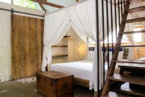 Letto o letti in una camera di Chanteak Bali
