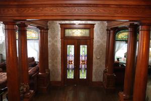 a room with two doors with stained glass at VAAST Bed & Breakfast in Adamstown