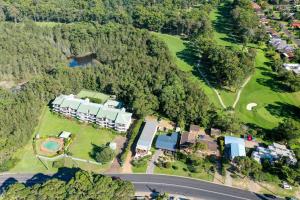 an aerial view of a park with houses and trees at Fathoms 9 in Mollymook