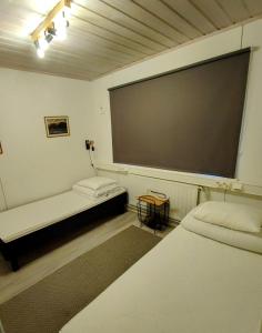 Postel nebo postele na pokoji v ubytování Maggala apartments