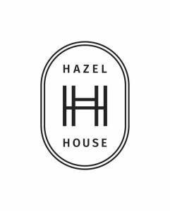 een zwart-wit logo voor een huis bij Hazel House Goulburn in Goulburn