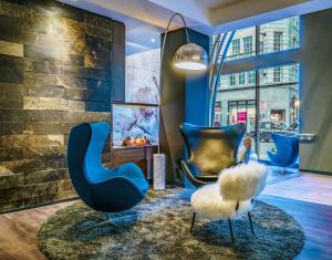 Гостиная зона в Motel One Manchester-Royal Exchange