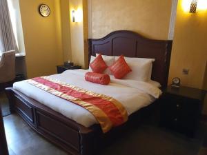 Asyana Gardens客房内的一张或多张床位