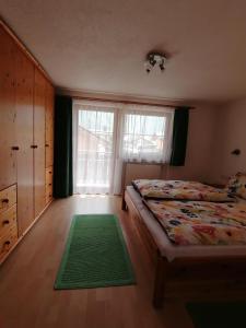 Llit o llits en una habitació de Ferienwohnung Pohl