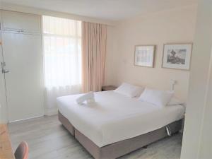 Postel nebo postele na pokoji v ubytování Bathurst Explorers Motel