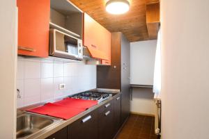 Kuchyň nebo kuchyňský kout v ubytování Residence Viola