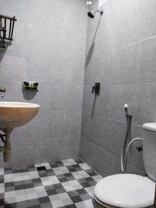 Koupelna v ubytování Hotel Lestari