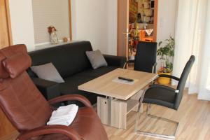 Posezení v ubytování Gästehaus zur schönen Aussicht + 6 fotografií