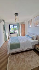 Ένα ή περισσότερα κρεβάτια σε δωμάτιο στο Amazing Sea & Mountain Duplex in Izmit