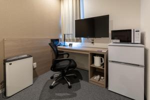 Kuchyň nebo kuchyňský kout v ubytování HOTEL R9 The Yard Togane