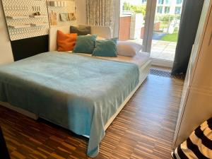 Postel nebo postele na pokoji v ubytování CHILLIapartamenty- Zielone Tarasy- GEOGRAFIC