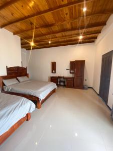 Letto o letti in una camera di The Reef Resort