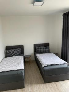 Postel nebo postele na pokoji v ubytování A1 Unterkunft