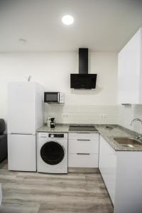 Kuchyň nebo kuchyňský kout v ubytování Apartamentos Linersol
