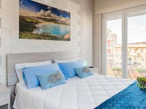 Postel nebo postele na pokoji v ubytování Cagliari Magica bellissimo appartamento panoramico in centro