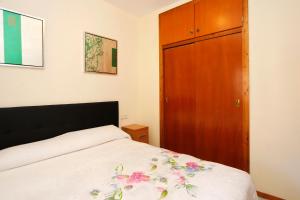 Posteľ alebo postele v izbe v ubytovaní AT007 Apartamento a 150 m de la playa