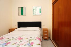 Posteľ alebo postele v izbe v ubytovaní AT007 Apartamento a 150 m de la playa