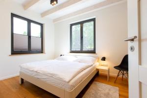 Postel nebo postele na pokoji v ubytování Seewärts