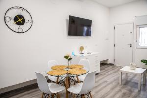 TV a/nebo společenská místnost v ubytování Apartamentos Linersol