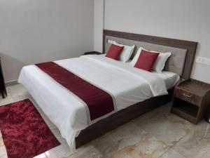 Oryx Home The Business Class Hotel客房内的一张或多张床位