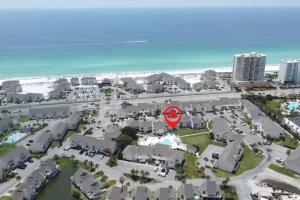 an aerial view of a city with the beach at Hook, Wine, & Linger condo in Destin
